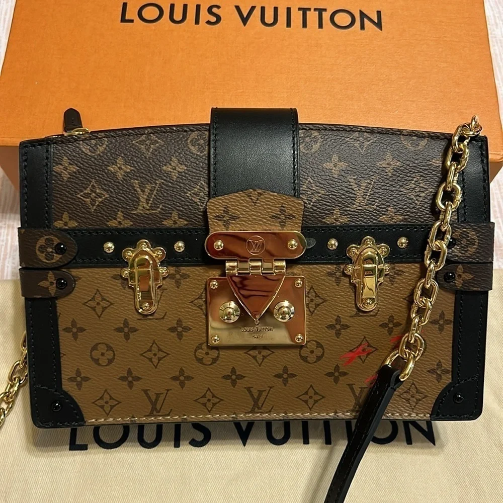 Louis Vuitton Trunk Clutch Reverse Monogram. New